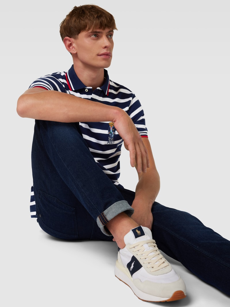 Poloshirt mit Streifenmuster in marineblau