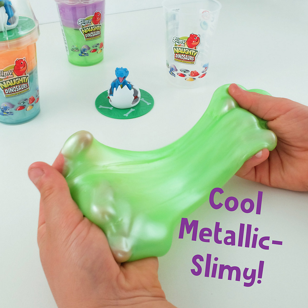 SLIMY® Dinosaur Collectible - 155g Original Slimy Slime Spielmasse in zwei Farben inkl. lustiger Dinosaurier Sammelfigur