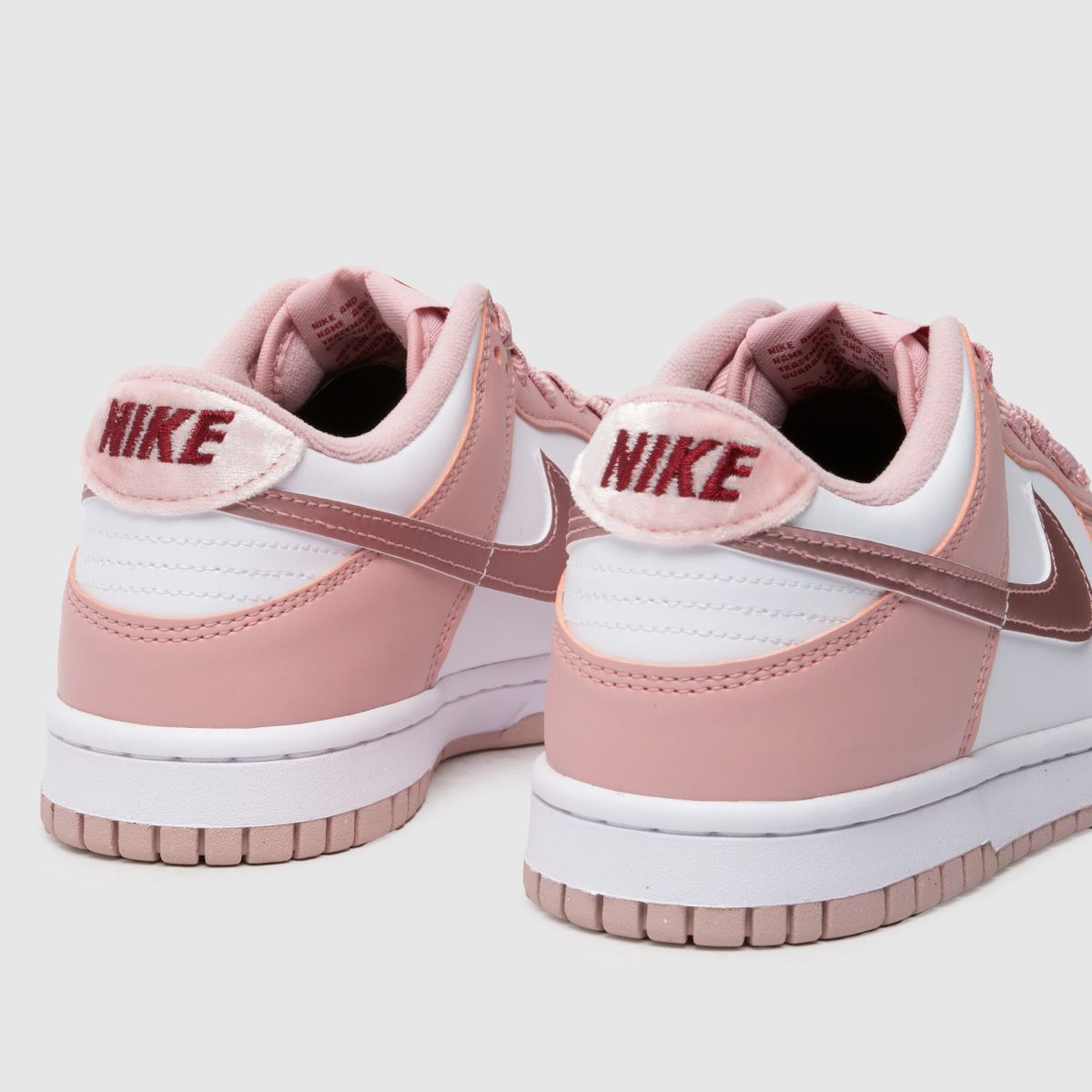 Nike Dunk Low flickor ungdomsskor i blekrosa