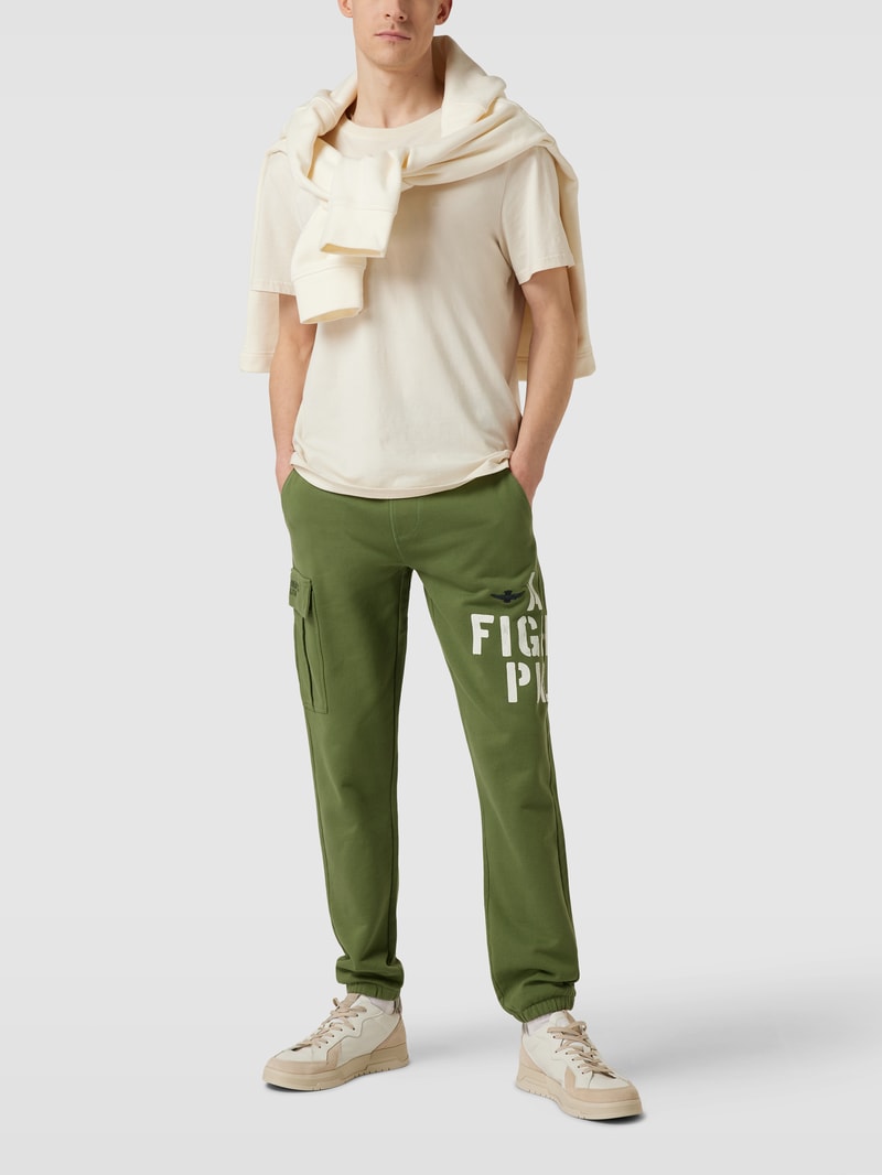 Sweatpants mit Label-Print in olivgrün