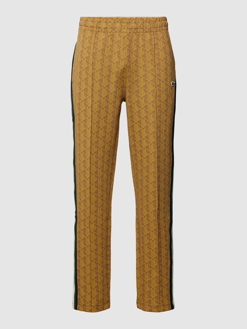 Regular Fit Sweatpants mit Allover-Muster und Galonstreifen in gelb