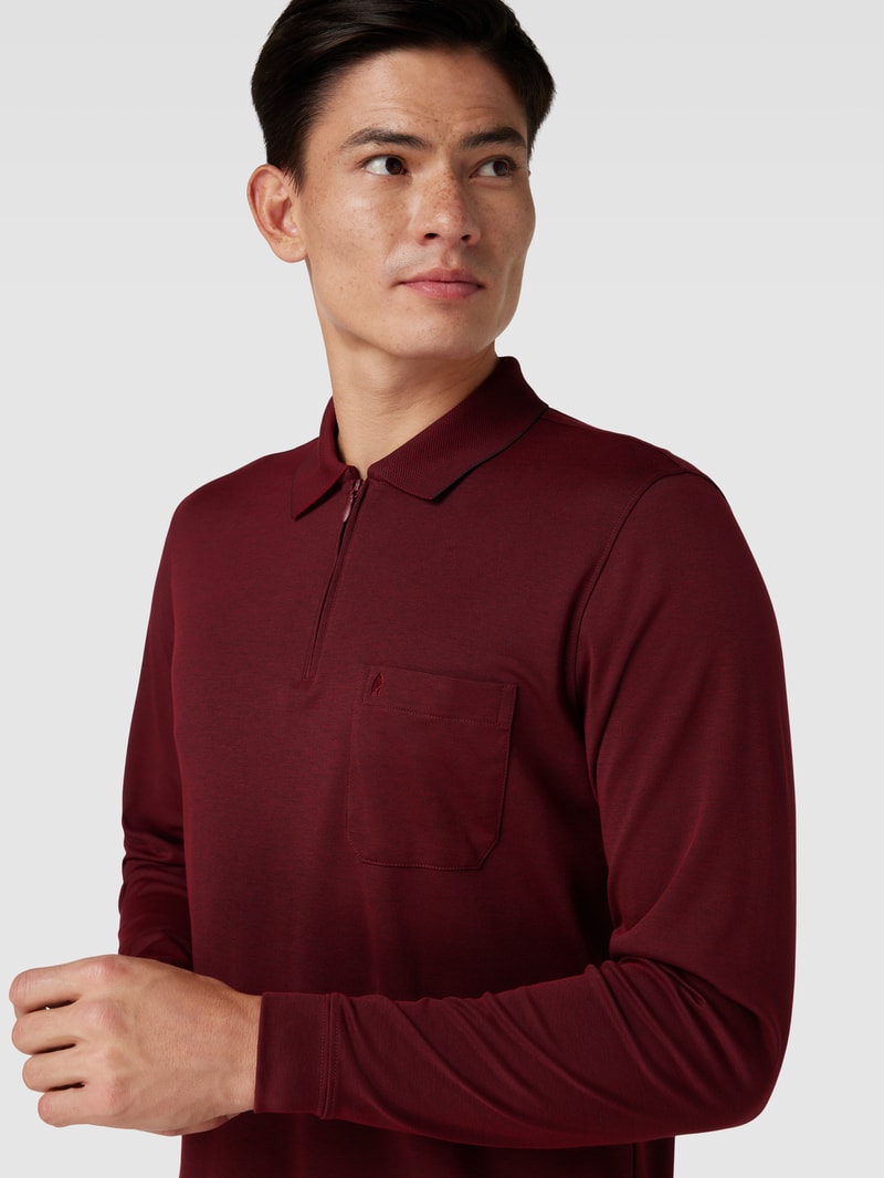 Poloshirt mit kurzer Reißverschlussleiste in bordeaux rot