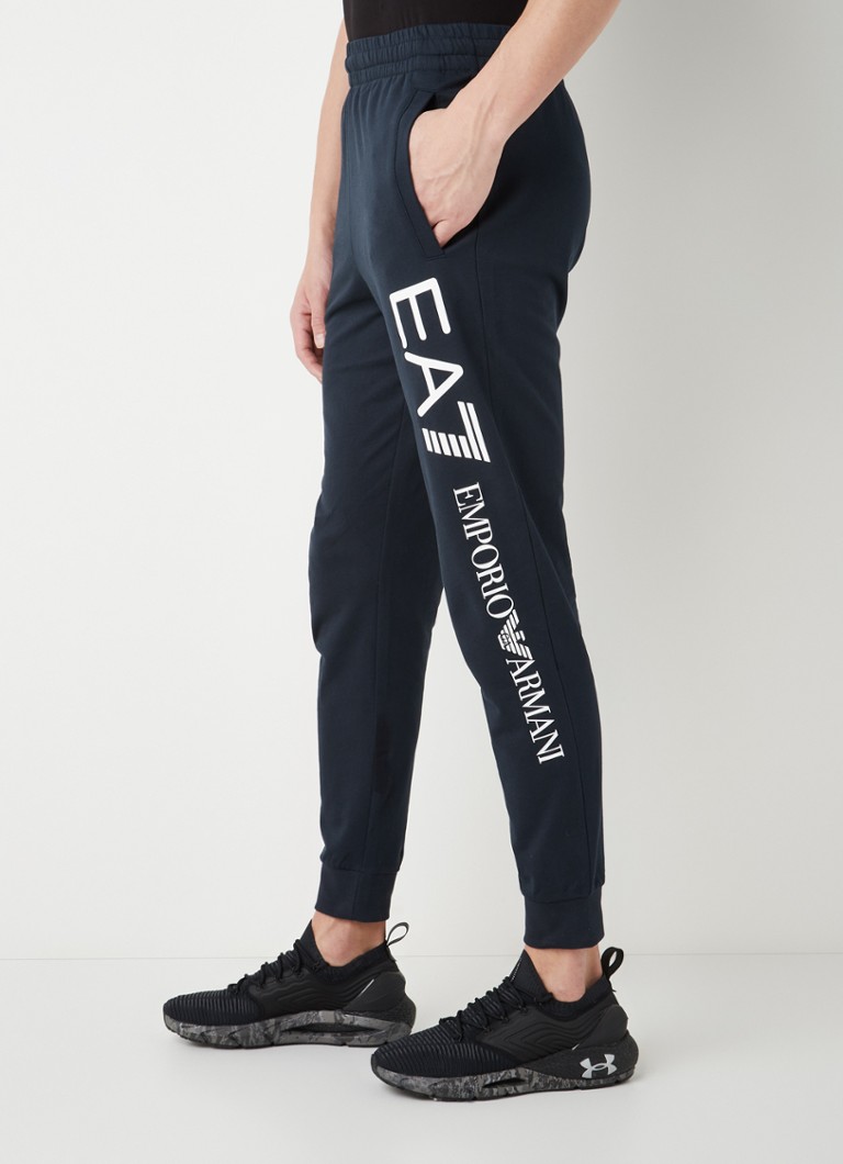 Teplákové nohavice Emporio Armani zúženého strihu s bočnými vreckami a potlačou loga