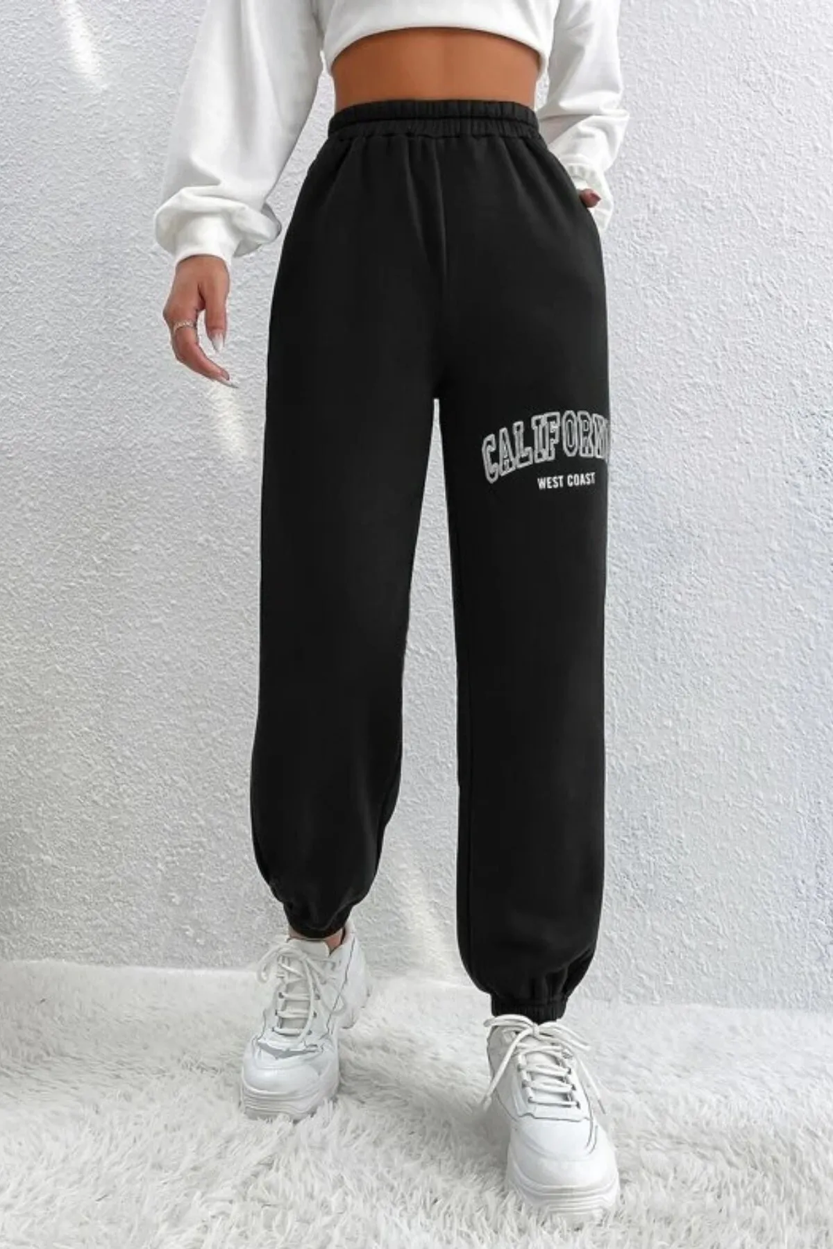 MODAGEN  Schwarze Unisex-Jogginghose in Übergröße mit California-Print und elastischen Beinen