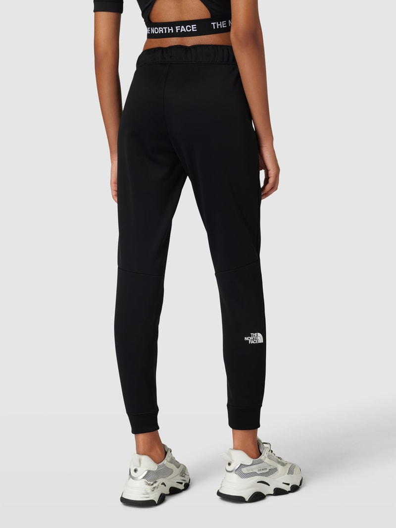 Sweatpants mit Label-Print Modell 'REAXION' in schwarz