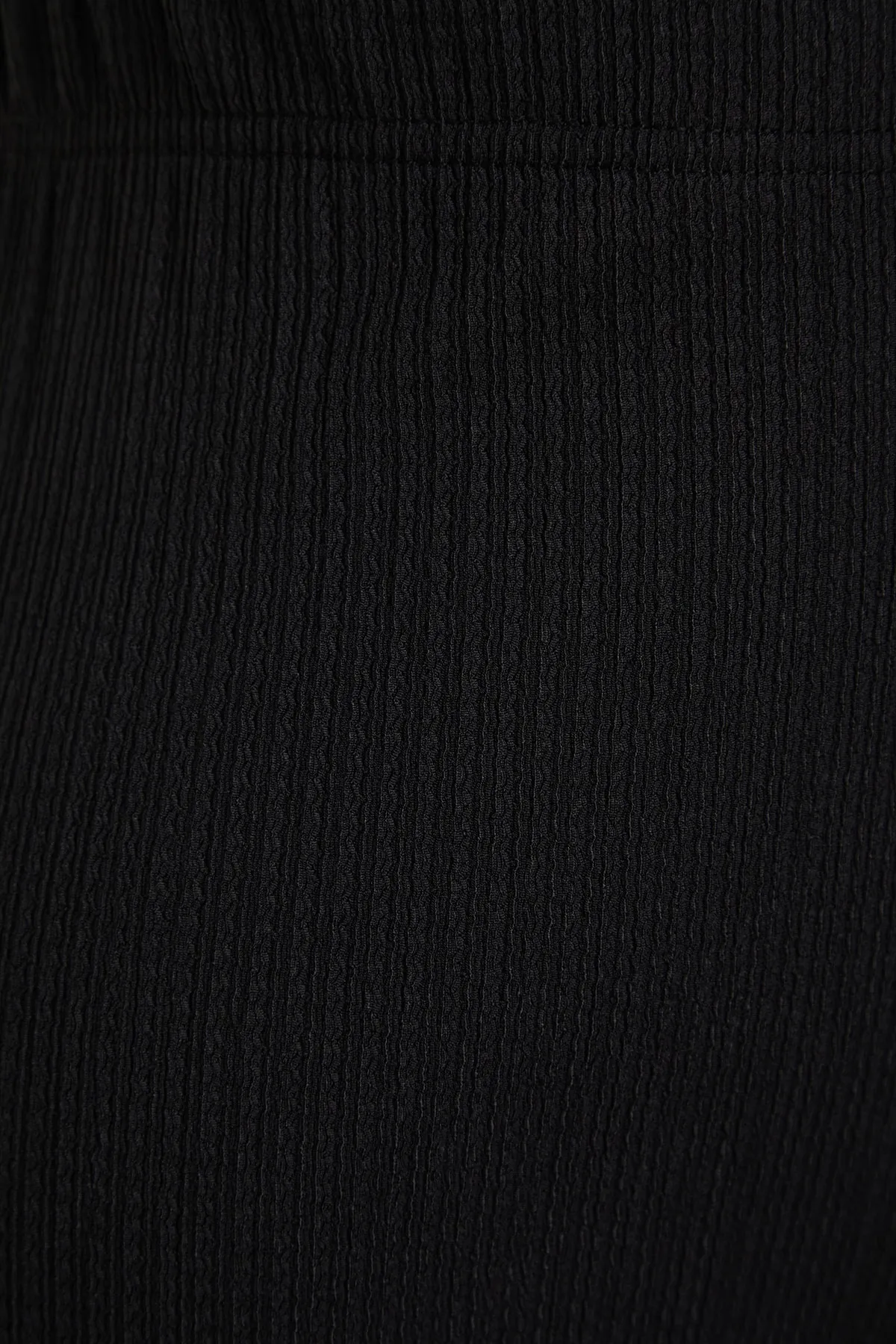 Trendyol Curve  Schwarze Strickhose mit spanischem Bein und hoher Taille TBSSS22PL0416