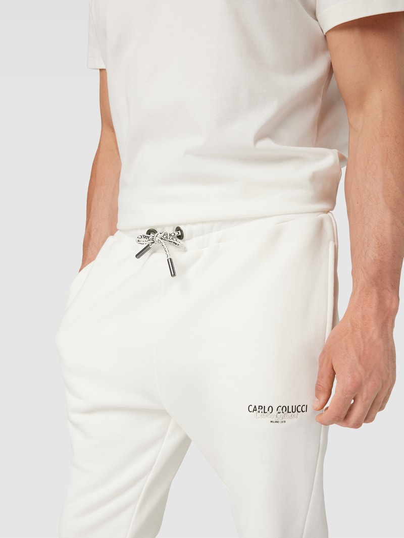 Sweatpants mit Label-Details in offwhite