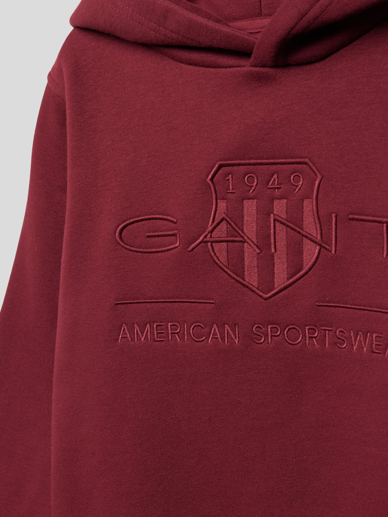Hoodie mit Label-Stitching Modell 'TONAL SHIELD' in bordeaux rot