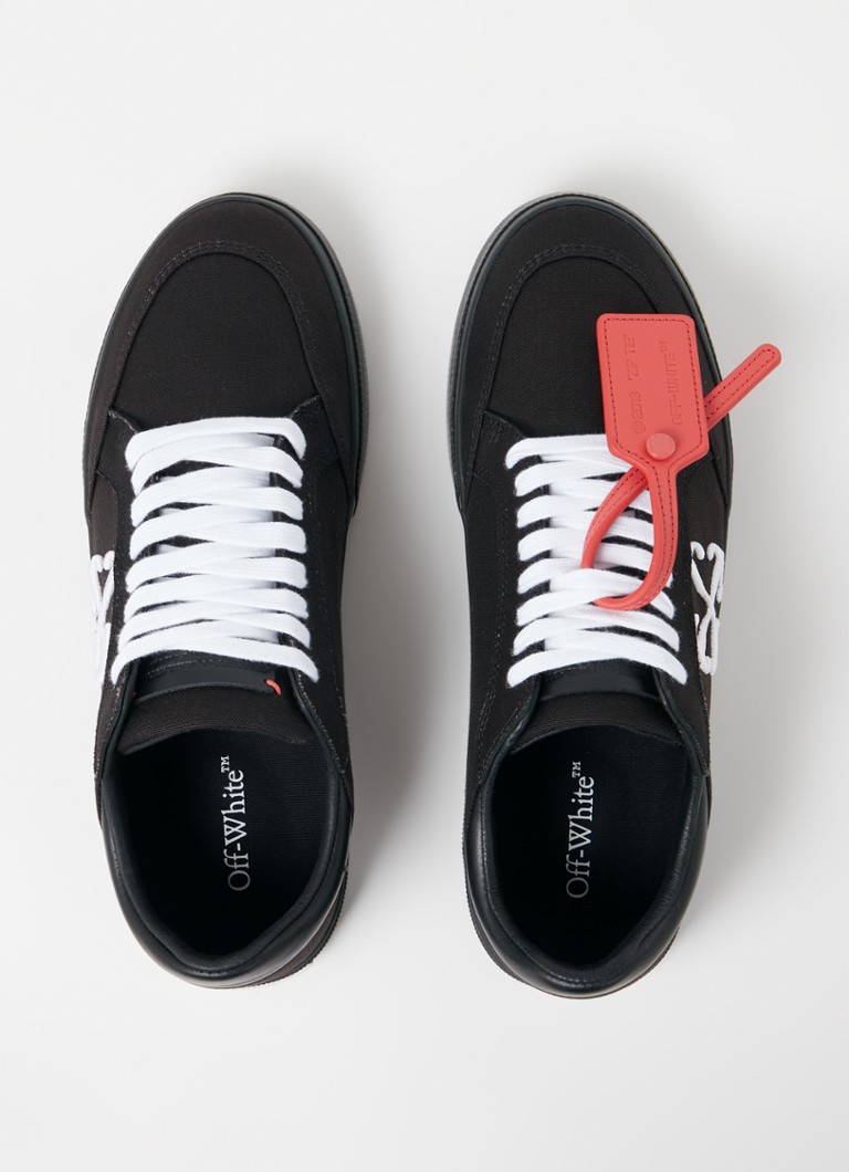 Niskie trampki Off-White wykonane z wulkanizowanego płótna ze skórzanymi detalami.