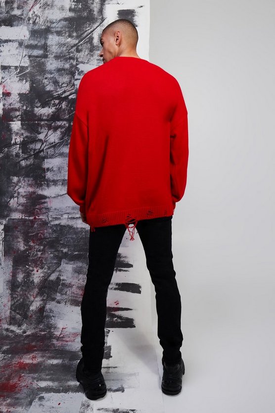 Oversize Pullover mit ausgefranstem Saum und Herz-Detail