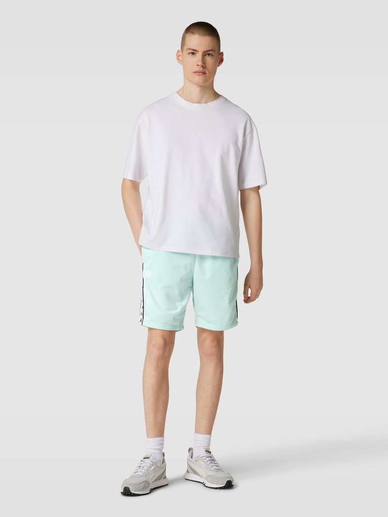 Sweatshorts mit Label-Stitching Modell 'Taped' in mint