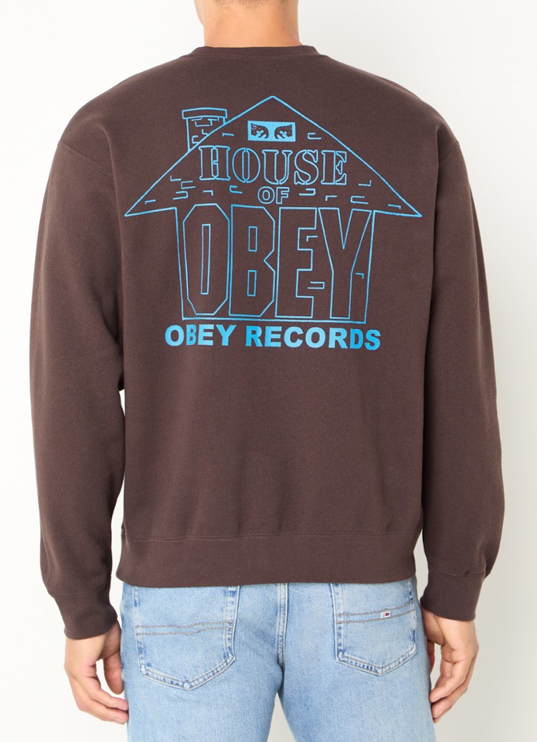 Džemper Obey House Of Obey Records s logotipom i printom na leđima