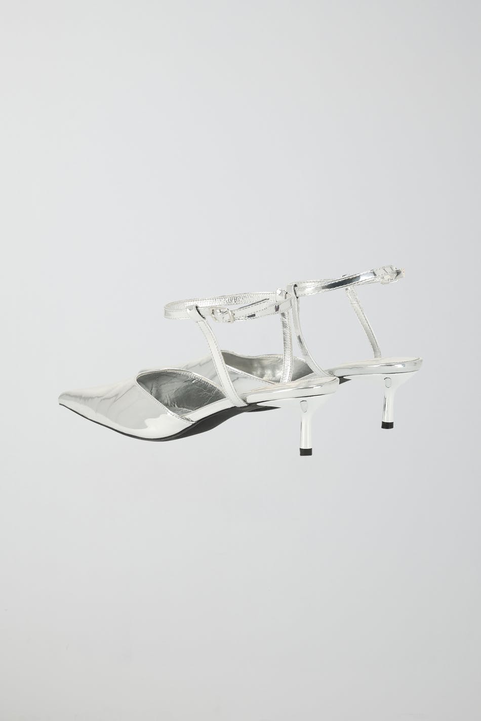 Pointed silver pumps