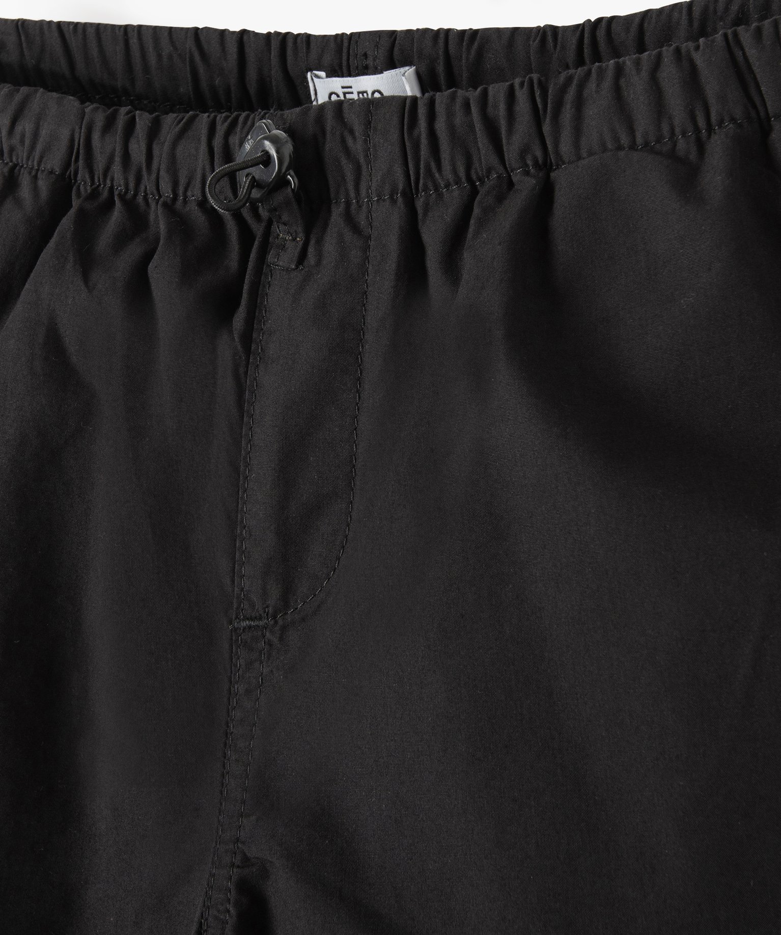 Pantalon parachute fille coupe large resserré aux chevilles noir | GEMO
