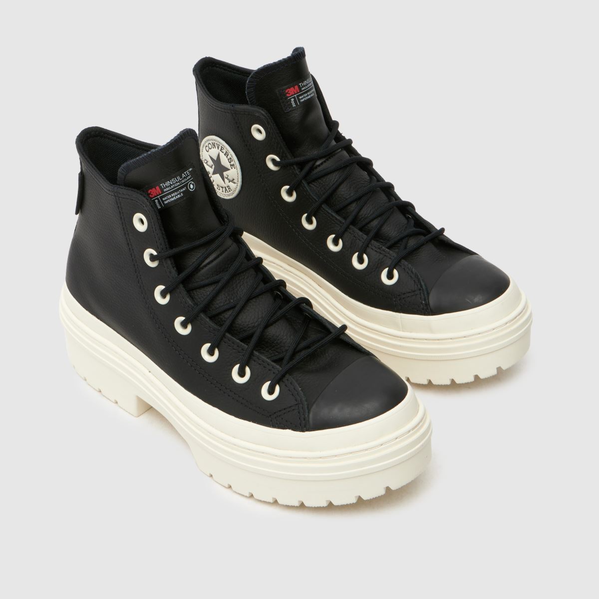 Converse All Star Lugged sarkú cipők fekete és fehér színben