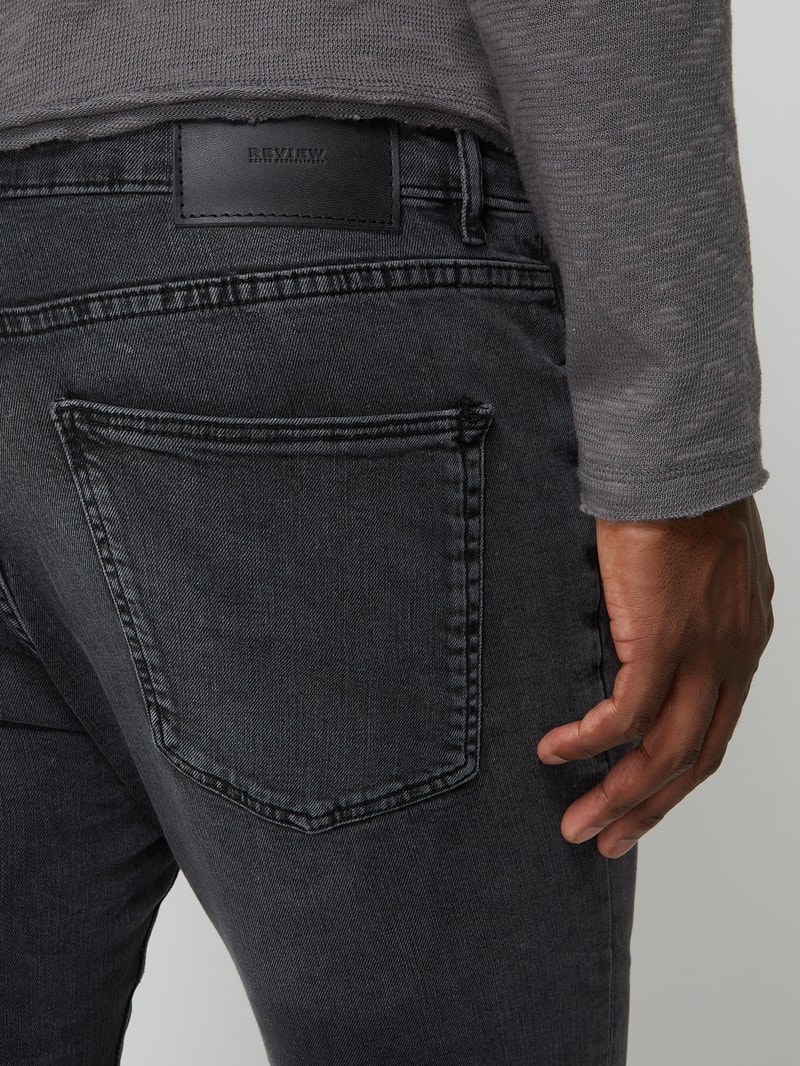 Skinny Fit Jeans mit Label-Patch in schwarz