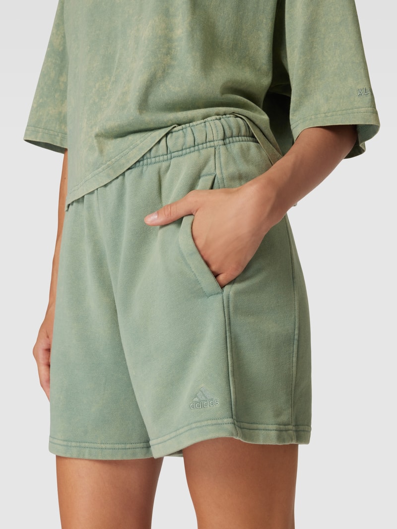 Shorts mit Label-Stitching in lindgrün