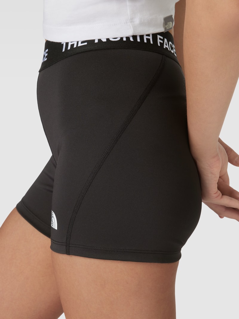 Shorts mit elastischem Logo-Bund in schwarz