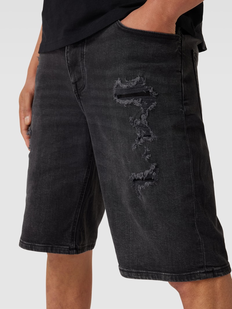 Jeansshorts im Destroyed-Look in schwarz