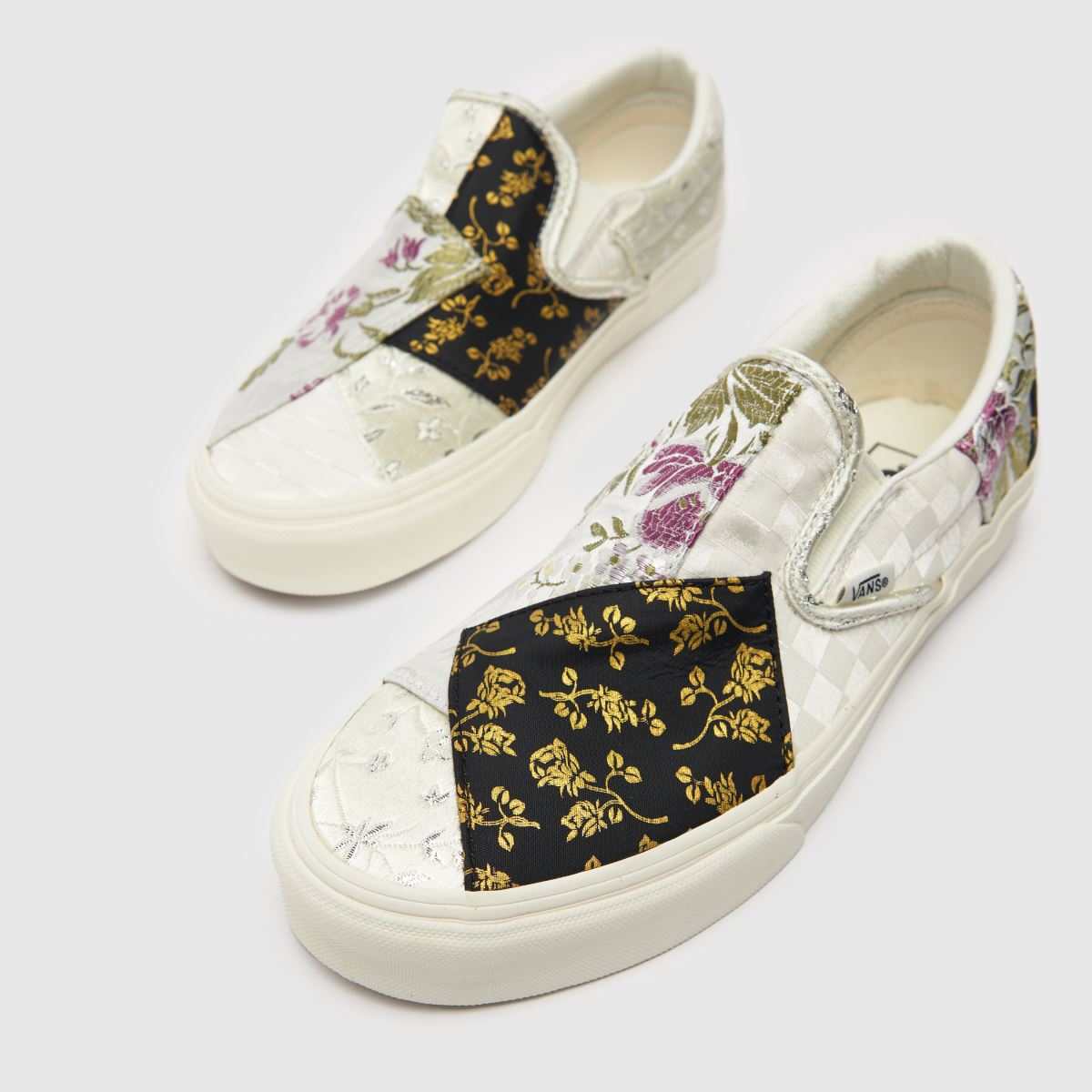 Vans – Slip-on-sneakers med lappmönster i grått och svart