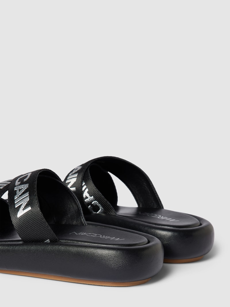 Pantoletten mit Label-Details in schwarz