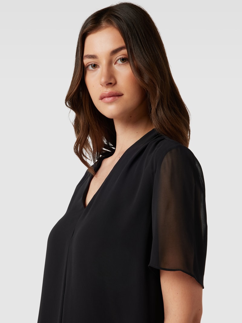Bluse mit V-Ausschnitt in schwarz