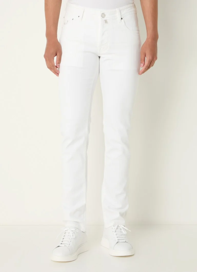 Blugi slim fit Nick de la Jacob Cohen, cu efect uzat.