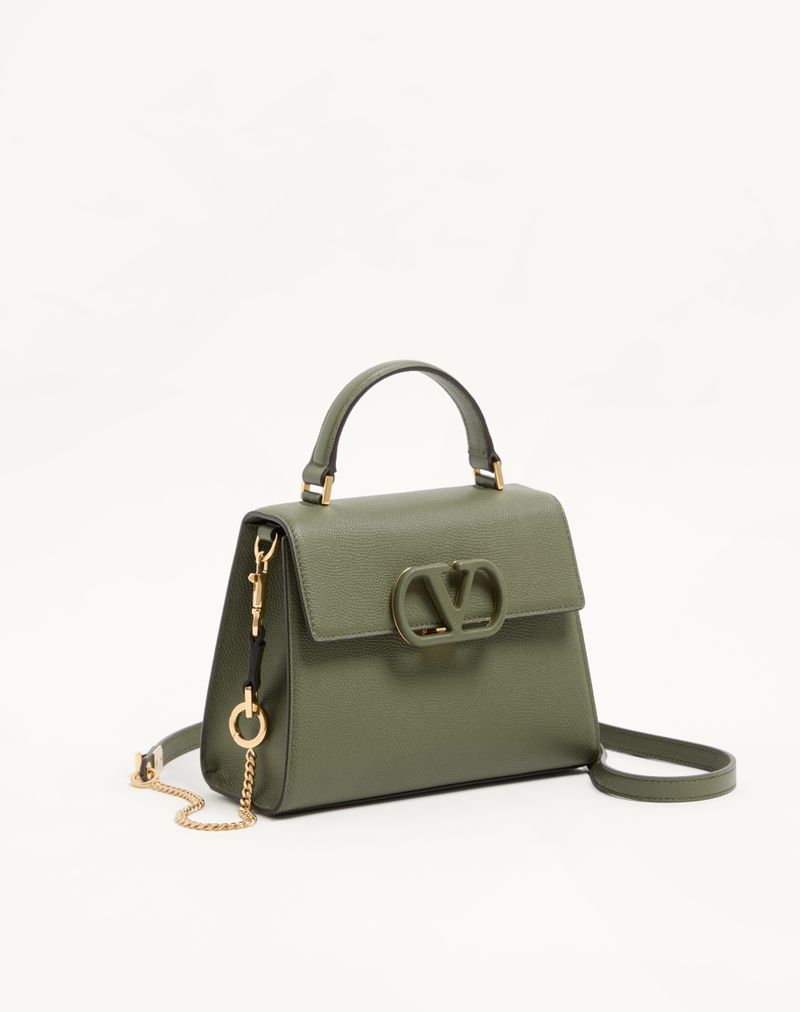 Bolsa Valentino Garavani Vsling pequena em couro de bezerro granulado.