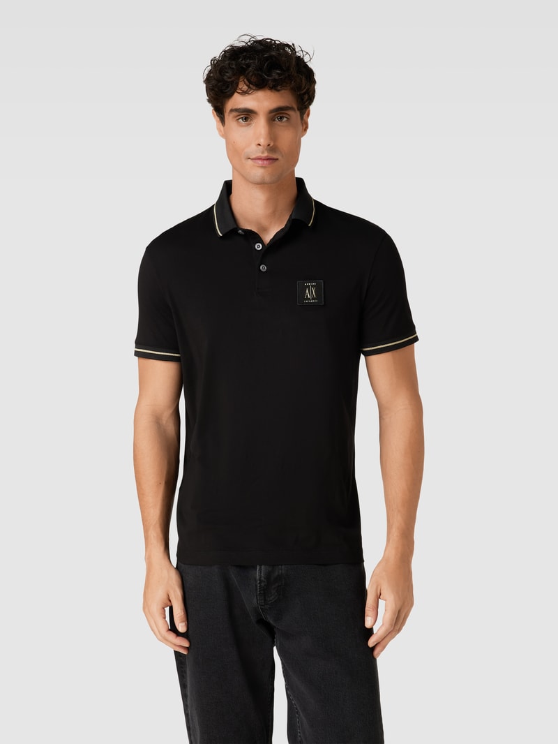 Poloshirt mit Label-Patch in schwarz