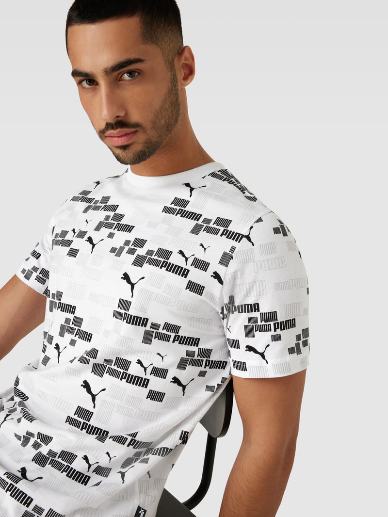 T-Shirt mit Allover-Logo-Print in weiß
