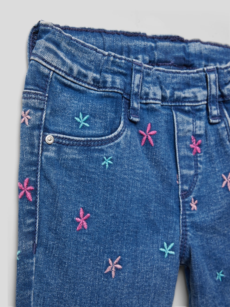 Jeans mit Motiv-Stitching in blau
