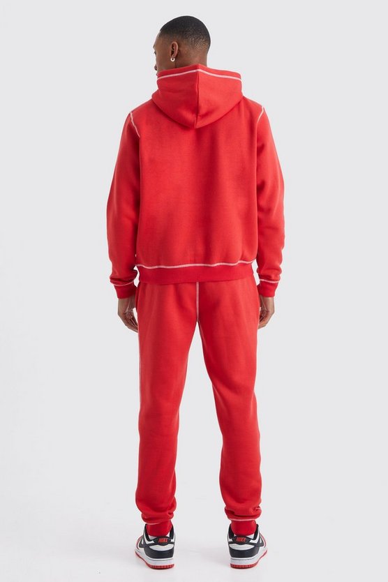 Trainingsanzug mit Borg-Applikation und Kontrast-Naht