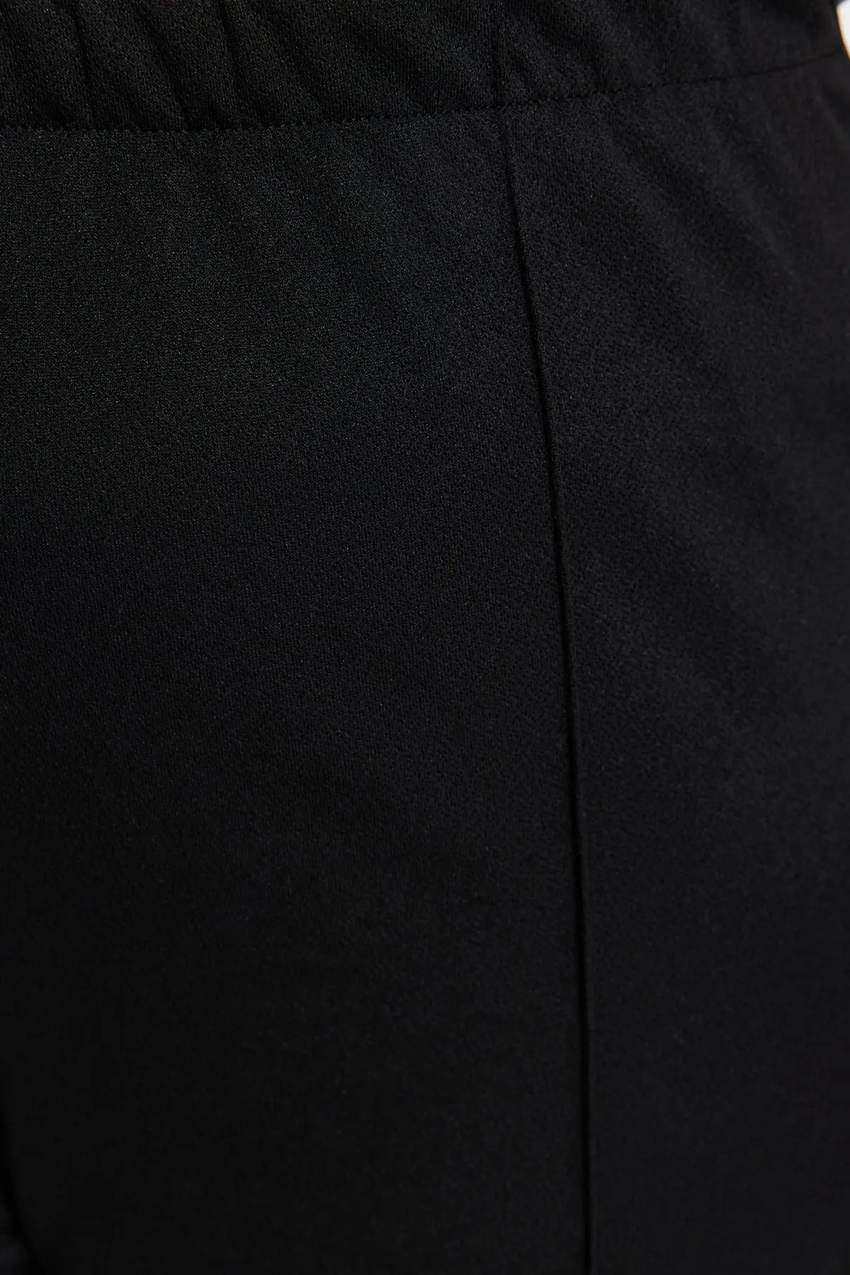 Trendyol Curve  Schwarze gerippte Strickhose aus Krepp mit hoher Taille TBBSS23AR00021