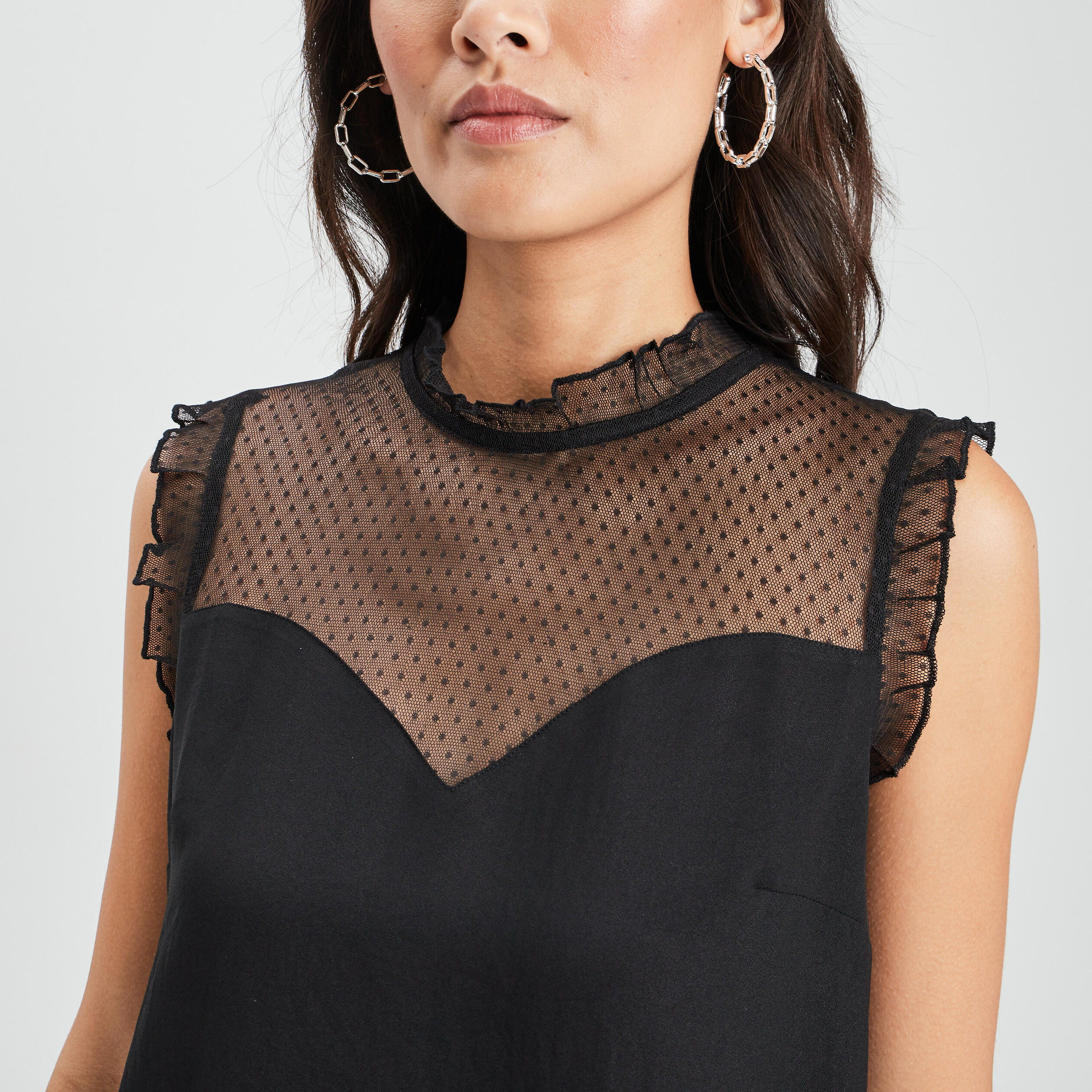 Blouse plumetis habillée sans manches noir femme | La Halle