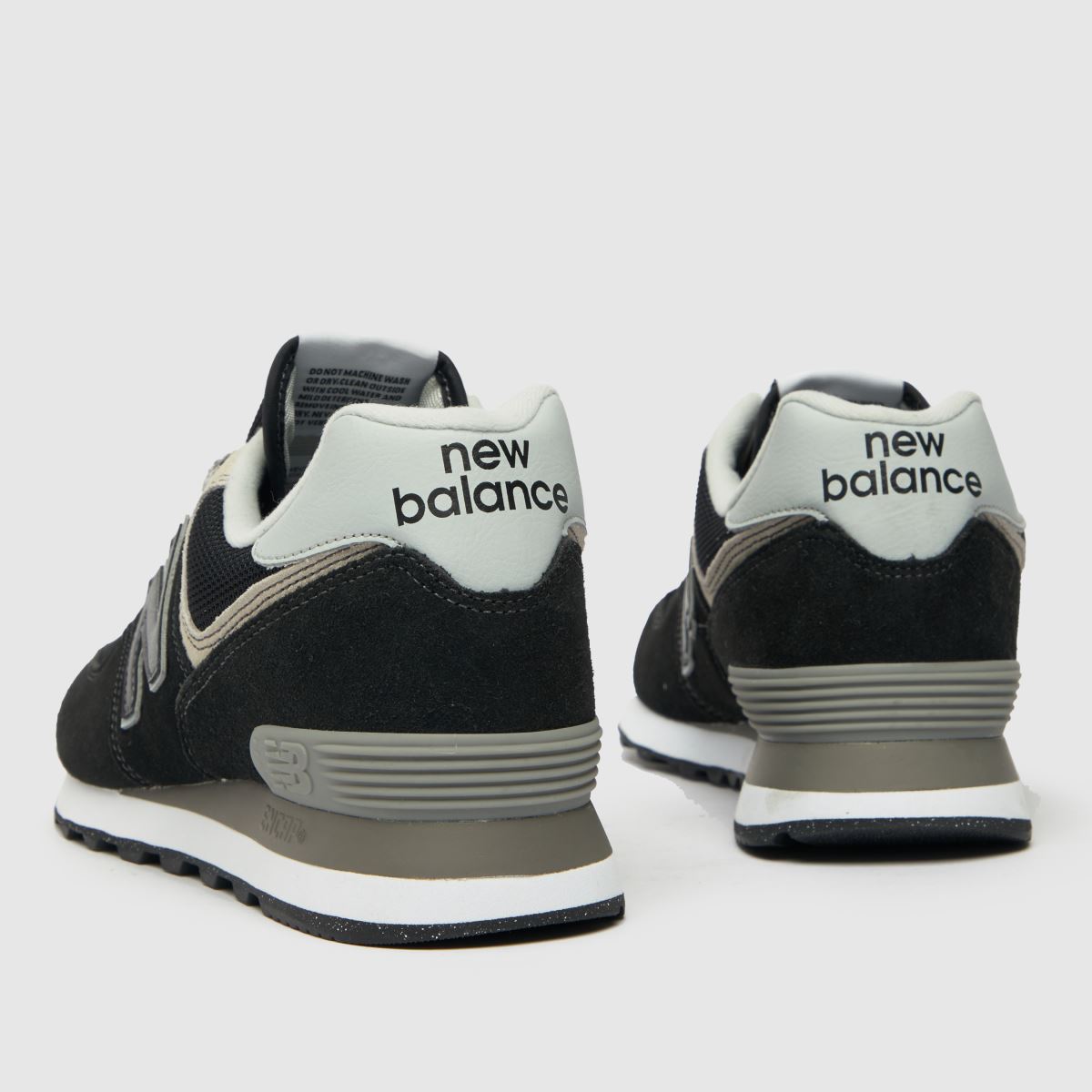 New Balance 574 cipők fekete és fehér színben