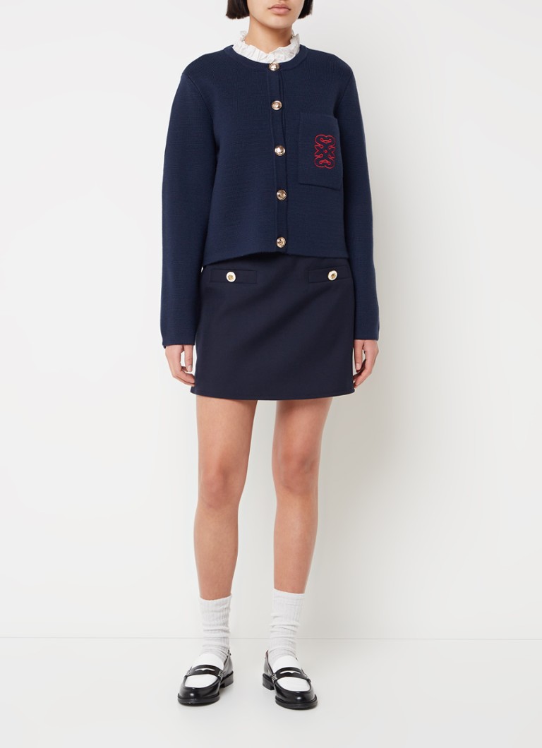 Cardigan Sandro in pregiata maglia di misto lana con collo removibile e tasca sul petto.