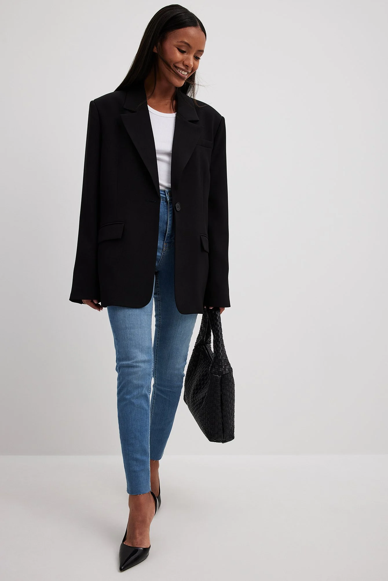Skinny-Jeans mit hoher Taille und rohem Saum
