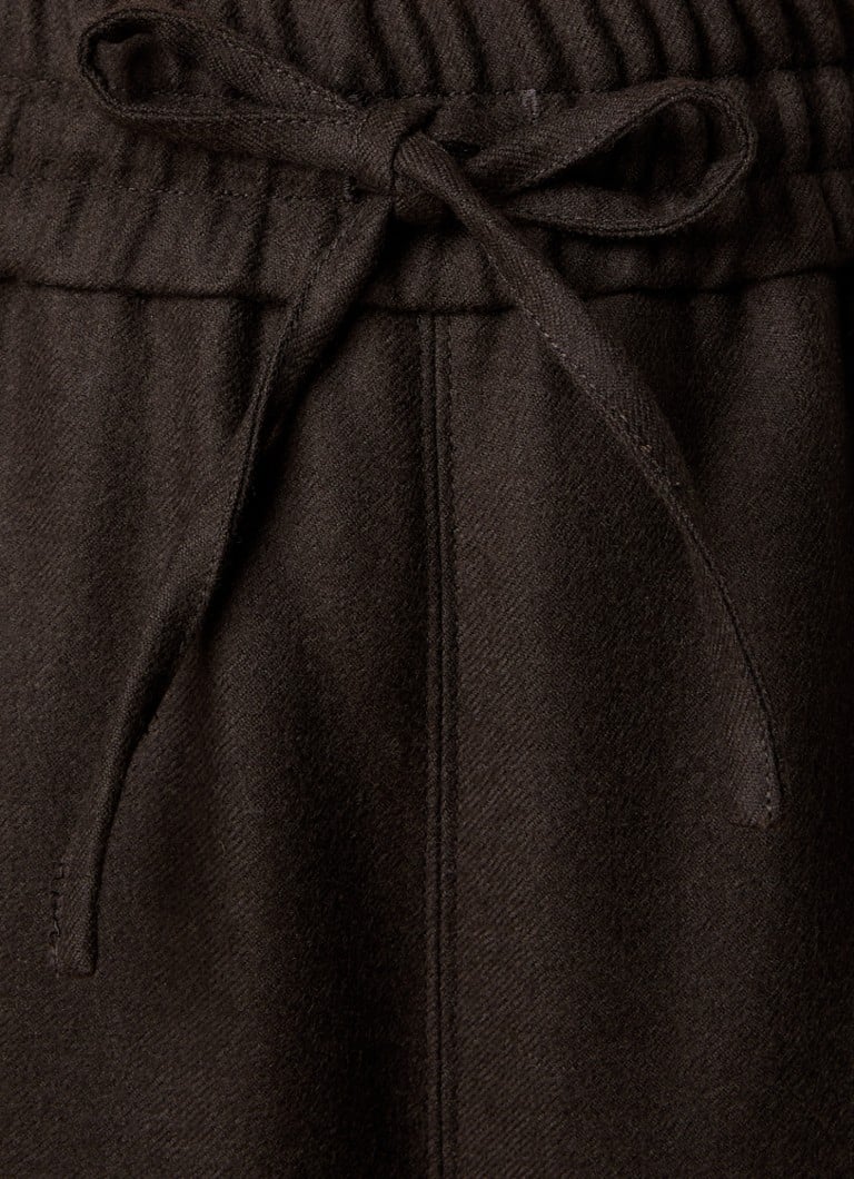 Pantaloni AMI Paris cu talie înaltă și croială largă, confecționați din lână virgină, cu buzunare laterale.