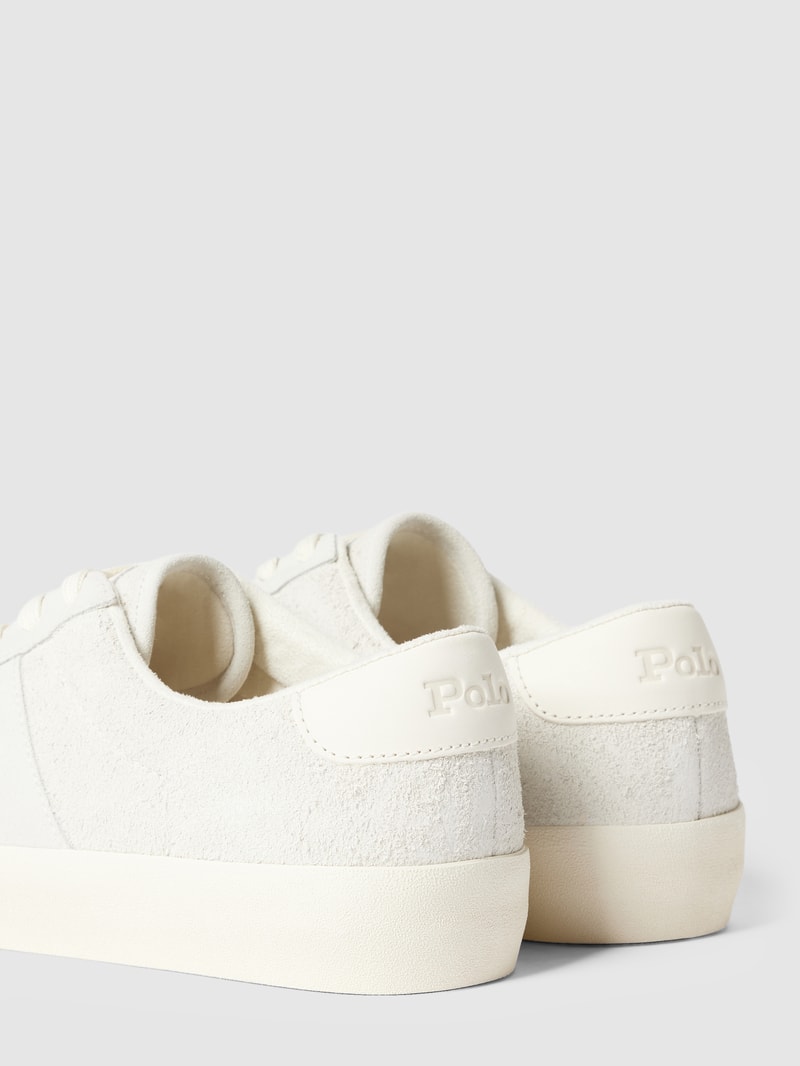 Sneaker mit Teddyfell-Besatz in offwhite