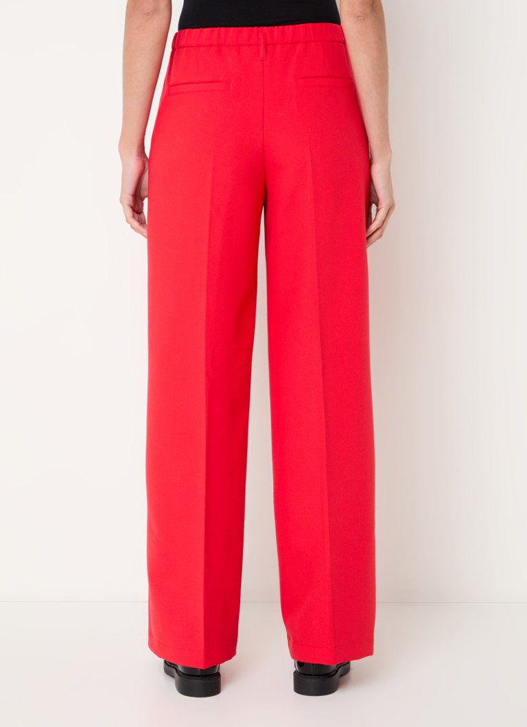 Pantaloni de vară cu talie înaltă, cu talie lată și buzunare laterale.