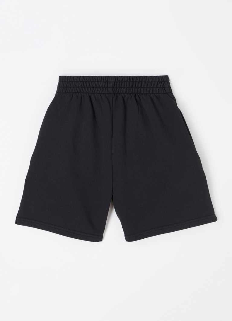Calções de treino Balenciaga de cintura alta, corte reto e com bolsos laterais.