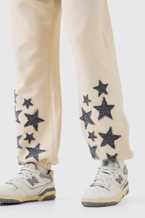 Gerade Jeans mit Acid-Waschung und Sternen-Applikation