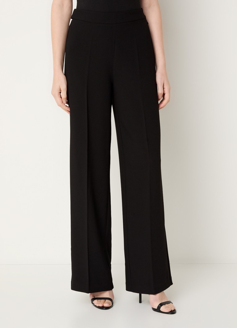 Pantaloni Lucas Dante 6 cu talie înaltă, cu talie largă și cu o cută bine definită.