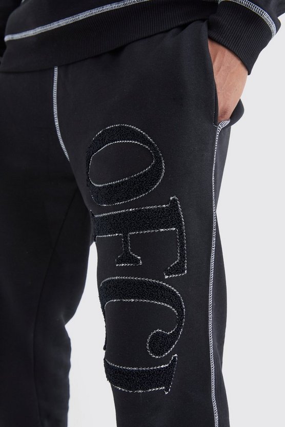 Jogginghose mit Borg-Applikation und Kontrast-Naht