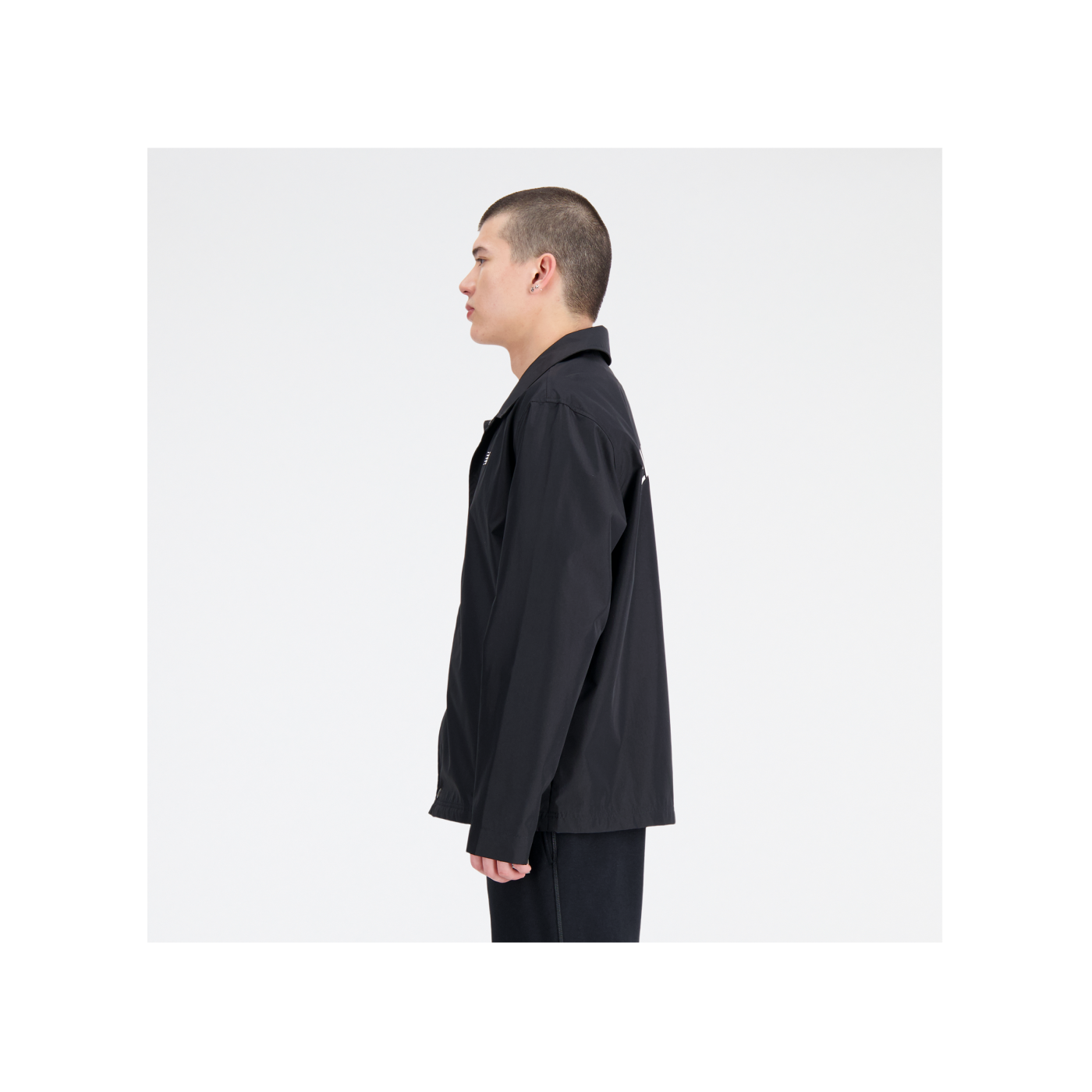 New Balance Essentials Coaches Jacke Schwarz F515