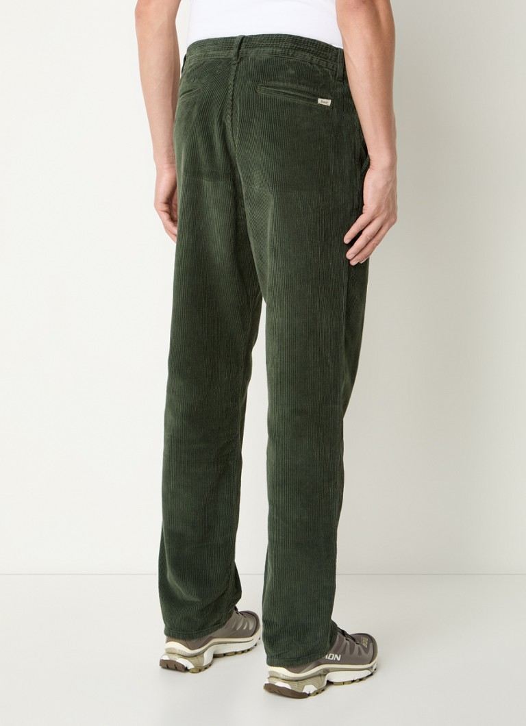 Pantaloni chino in velluto a coste a taglio dritto, modello Forét Clay, con tasche laterali.