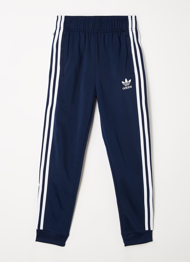 Adidas Superstar kapenevat verryttelyhousut logopainatuksella