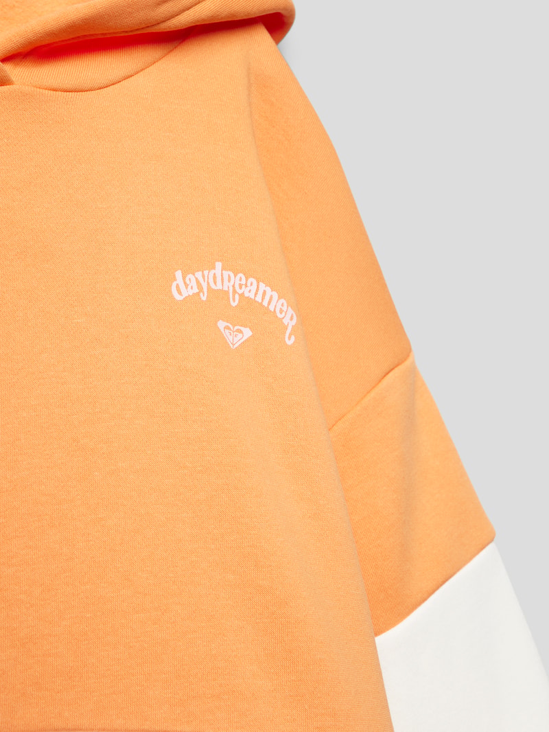 Hoodie mit Statement-Prints Modell 'DREAMS FOR PLANS' in orange