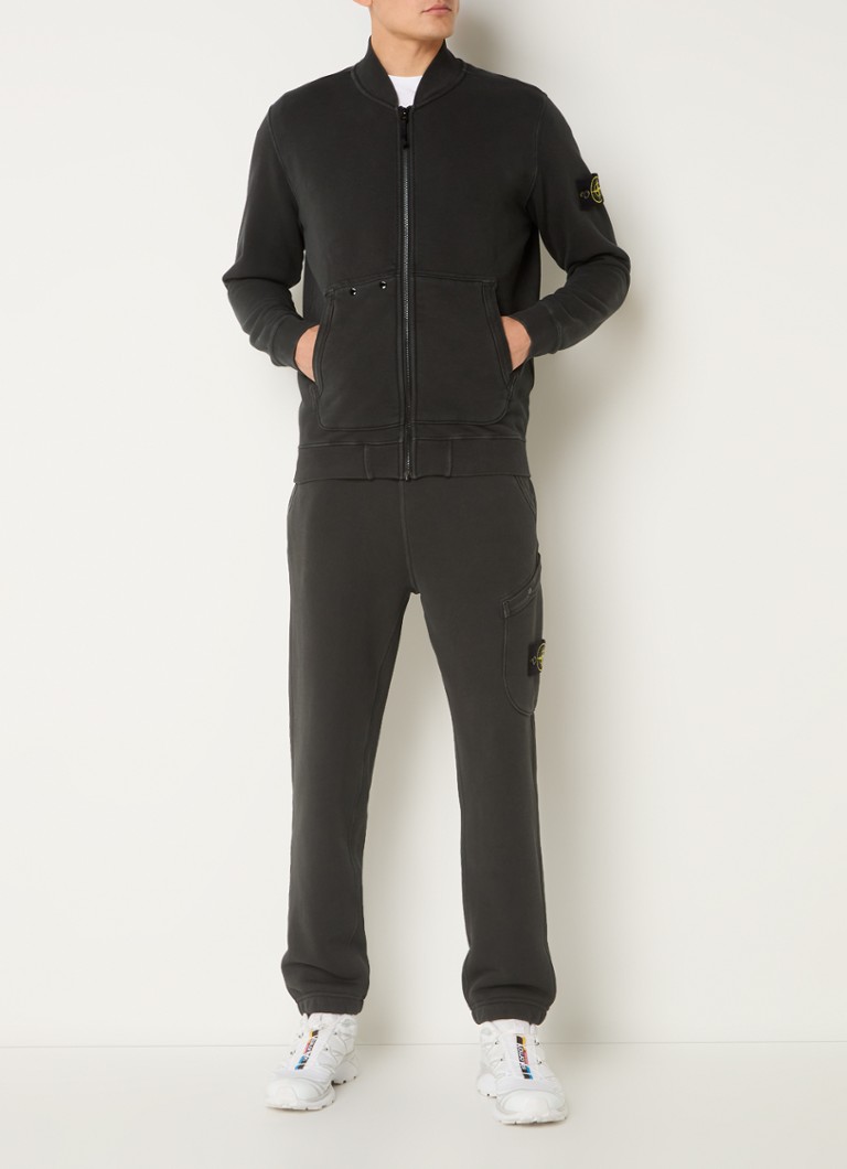 Bluza z kapturem Stone Island 65241 z logo i kieszeniami bocznymi.