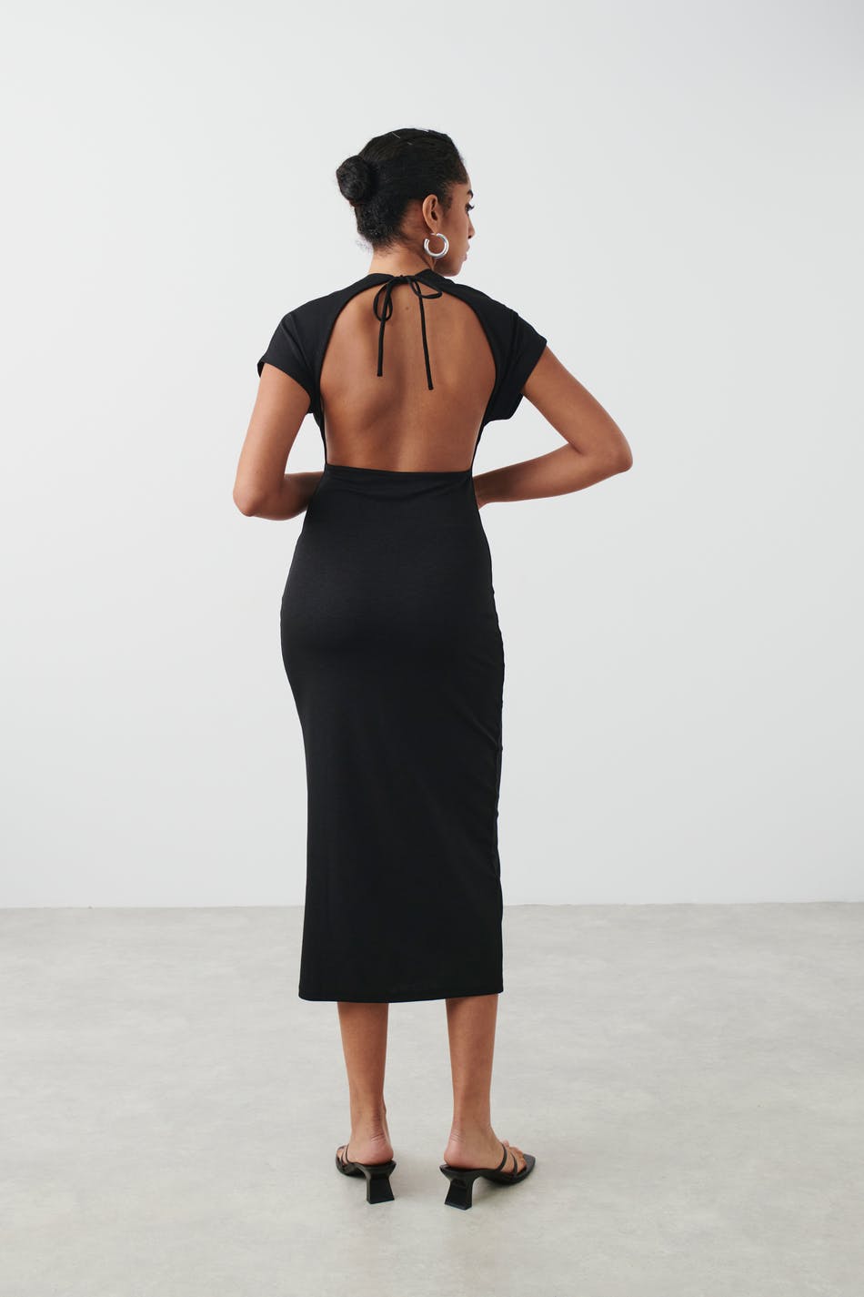 Open back funnel neck dress